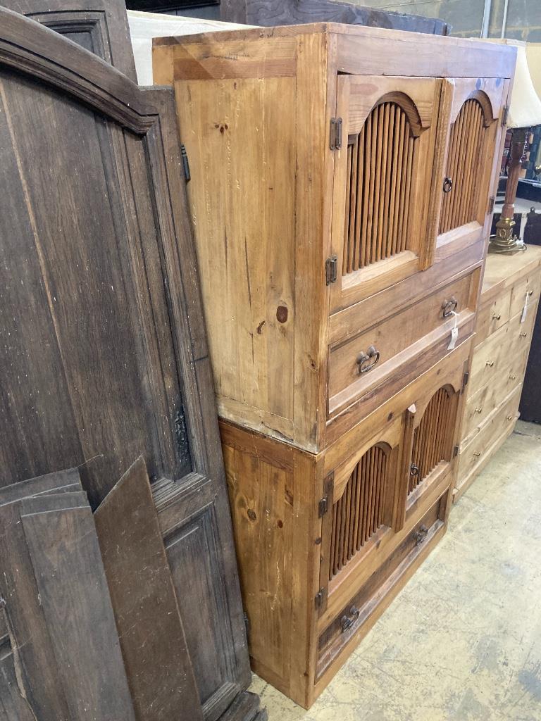 A Continental pine four door hutch cabinet, width 98cm, depth 46cm, height 175cm